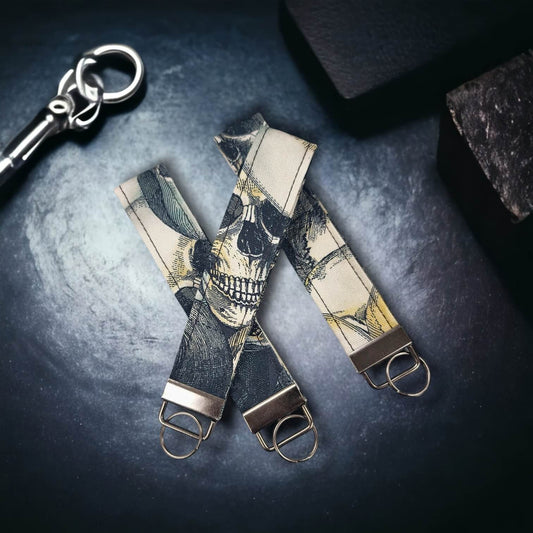 Our key wristlets/fobs in the pattern Skull-o-rama.