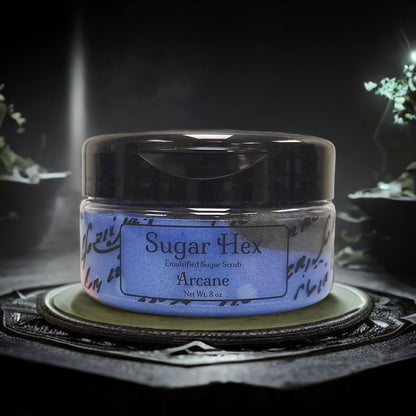 our sugar hex sugar scrub in the scent arcane.