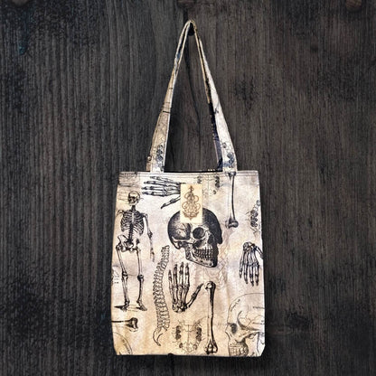 our boxed tote bags featuring our Bare Bones pattern.