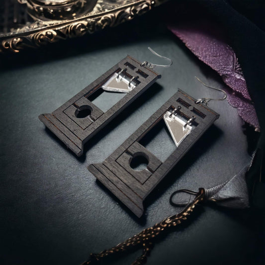 A picture of our wooden guillotine earrings with Black finish.