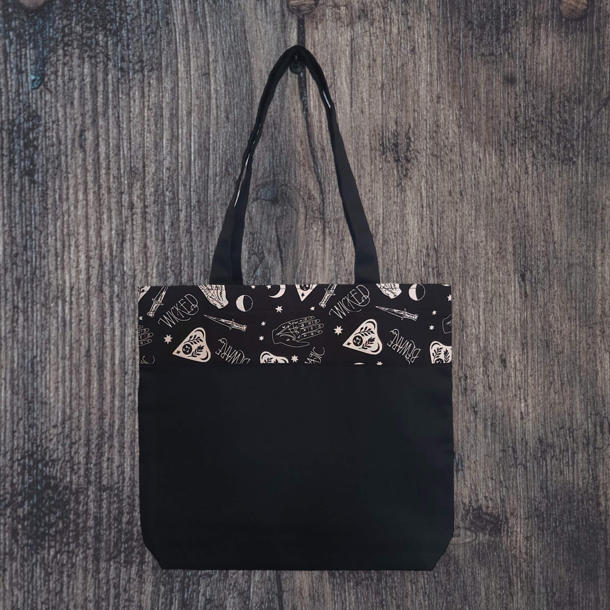 our accent tote bag featuring our Black Wicked Night pattern.