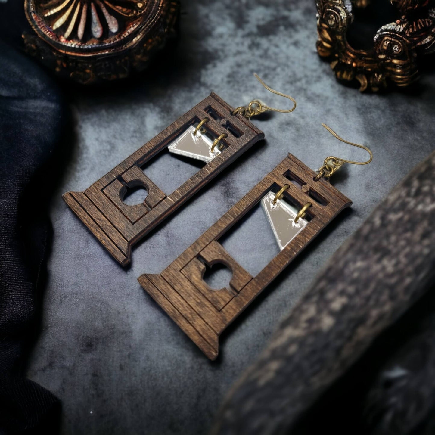 A picture of our wooden guillotine earrings with Provincial finish.