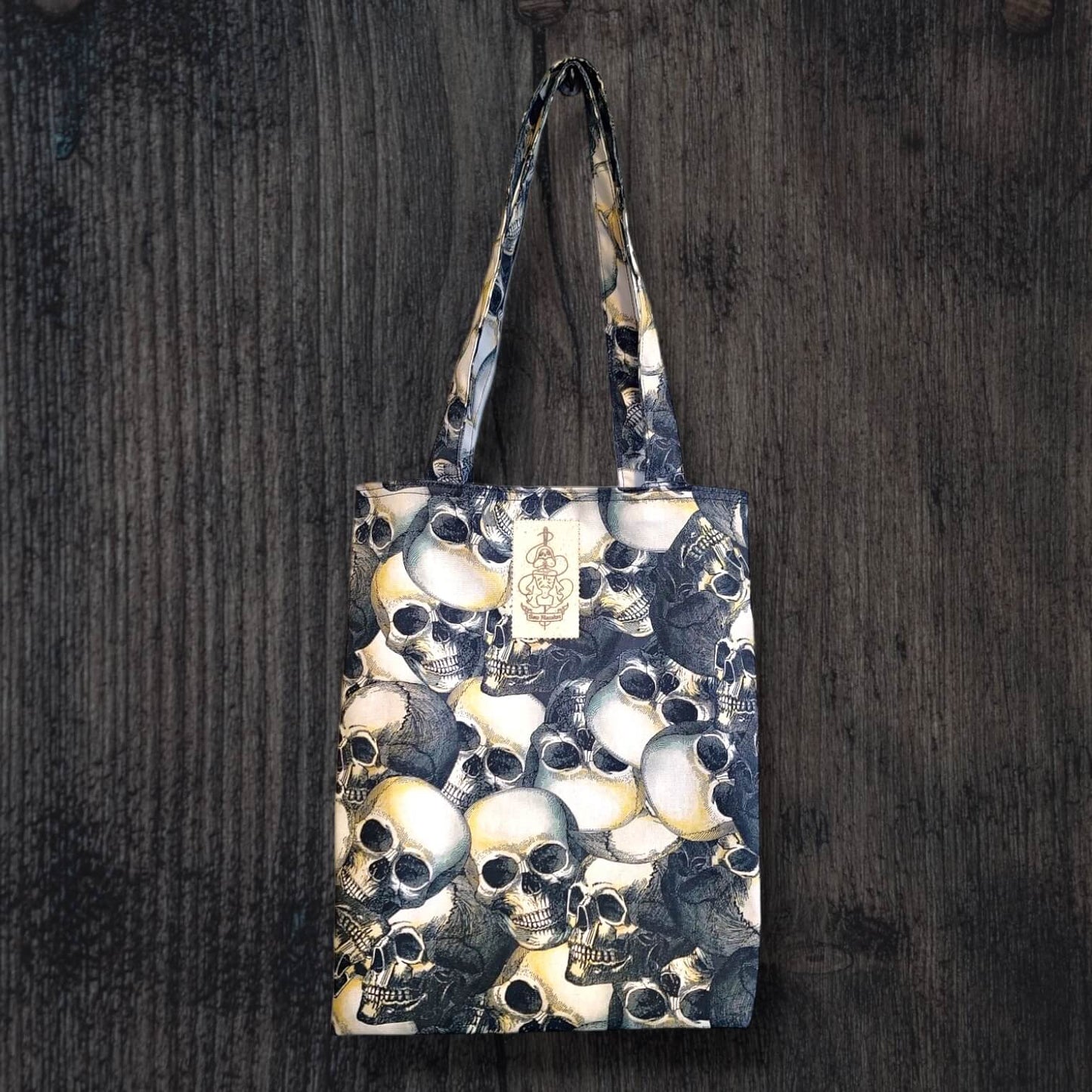 our boxed tote bags featuring our Skull-o-rama pattern.