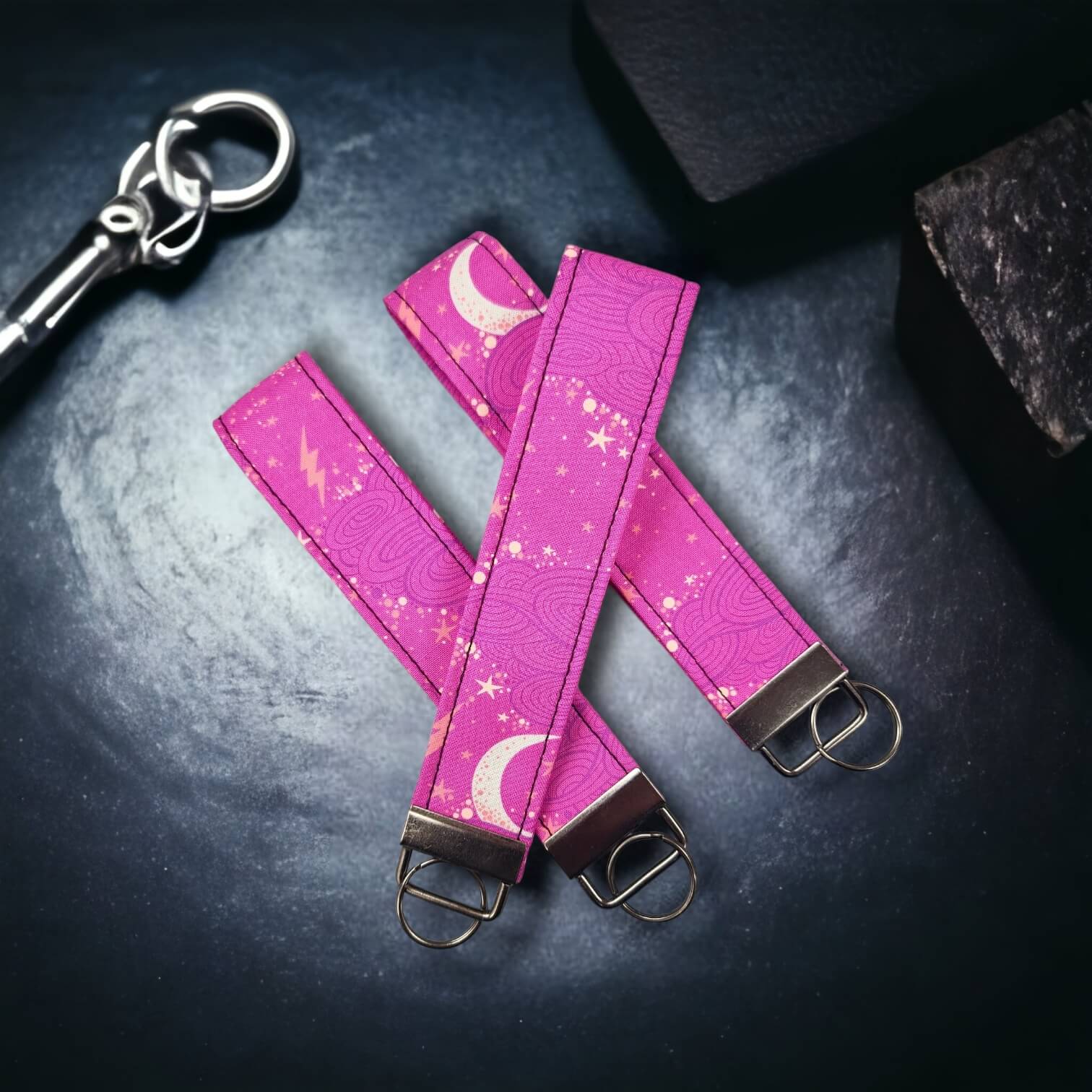 Our key wristlets/fobs in the pattern Pink Moonlight.